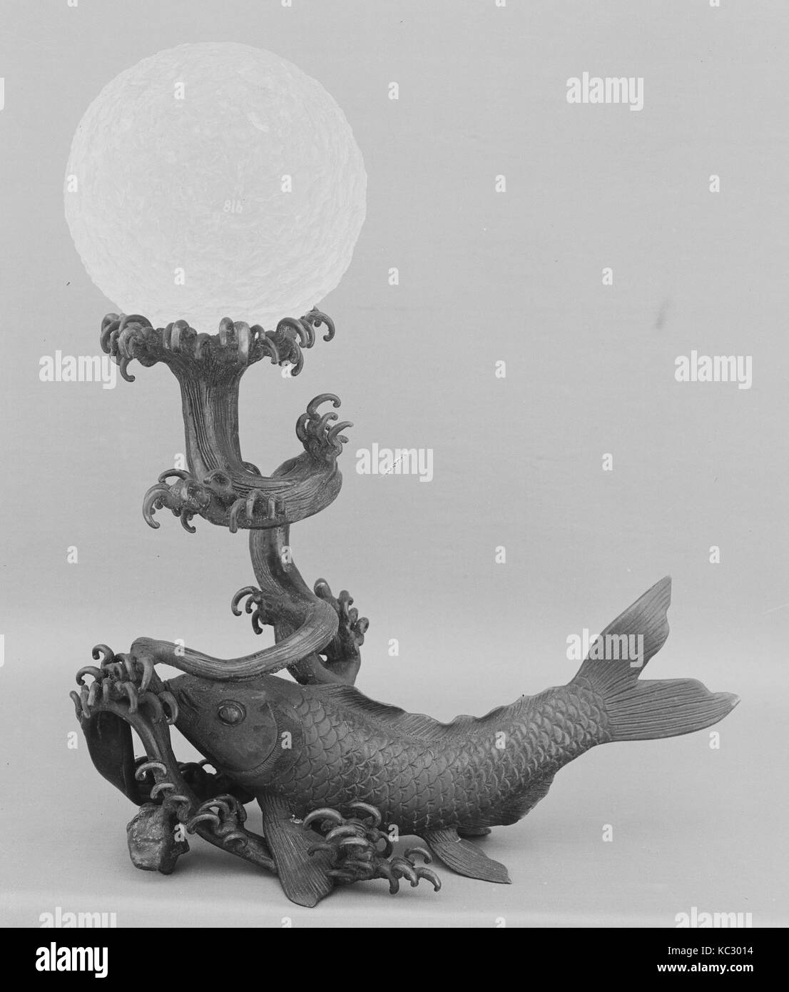 Crystal Ball on a Bronze Stand in the Shape of a Fish, 18th century Stock Photo