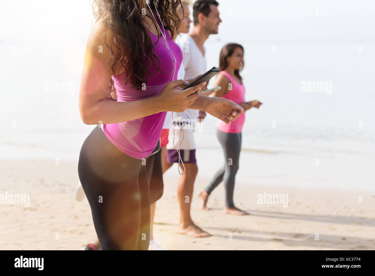 Man Taking Picture With Camera Phone Of Women In Bikinis Closeup