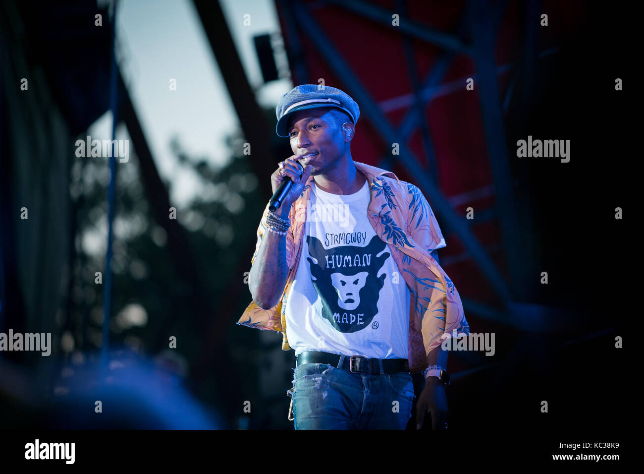 Pharrell Williams, the American singer, rapper and records producer performs a live concert at the Orange Stage at the Danish music festival Roskilde Festival 2015. Pharrell Williams is also known from the producer duo The Neptunes and the band N*E*R*D. Denmark, 01/07 2015. Stock Photo