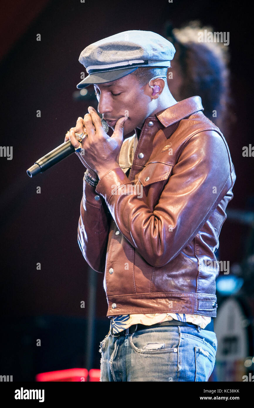 Pharrell Williams, the American singer, rapper and records producer performs a live concert at the Orange Stage at the Danish music festival Roskilde Festival 2015. Pharrell Williams is also known from the producer duo The Neptunes and the band N*E*R*D. Denmark, 01/07 2015. Stock Photo