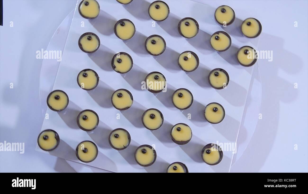 Top view on round cheesecakes on table. Yellow cupcakes. Yellow cake