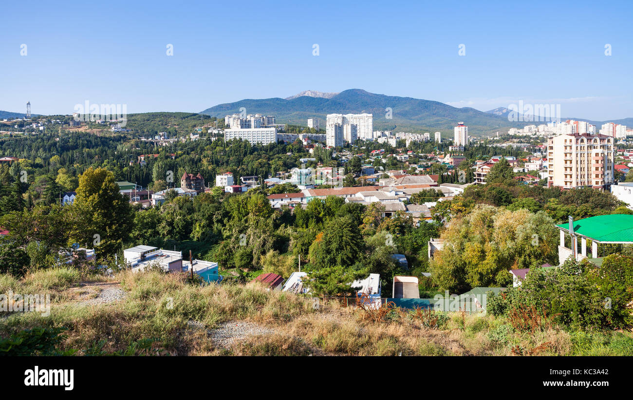 travel to Crimea - panorama of Alushta city from Castle Hill in sunny morning Stock Photo