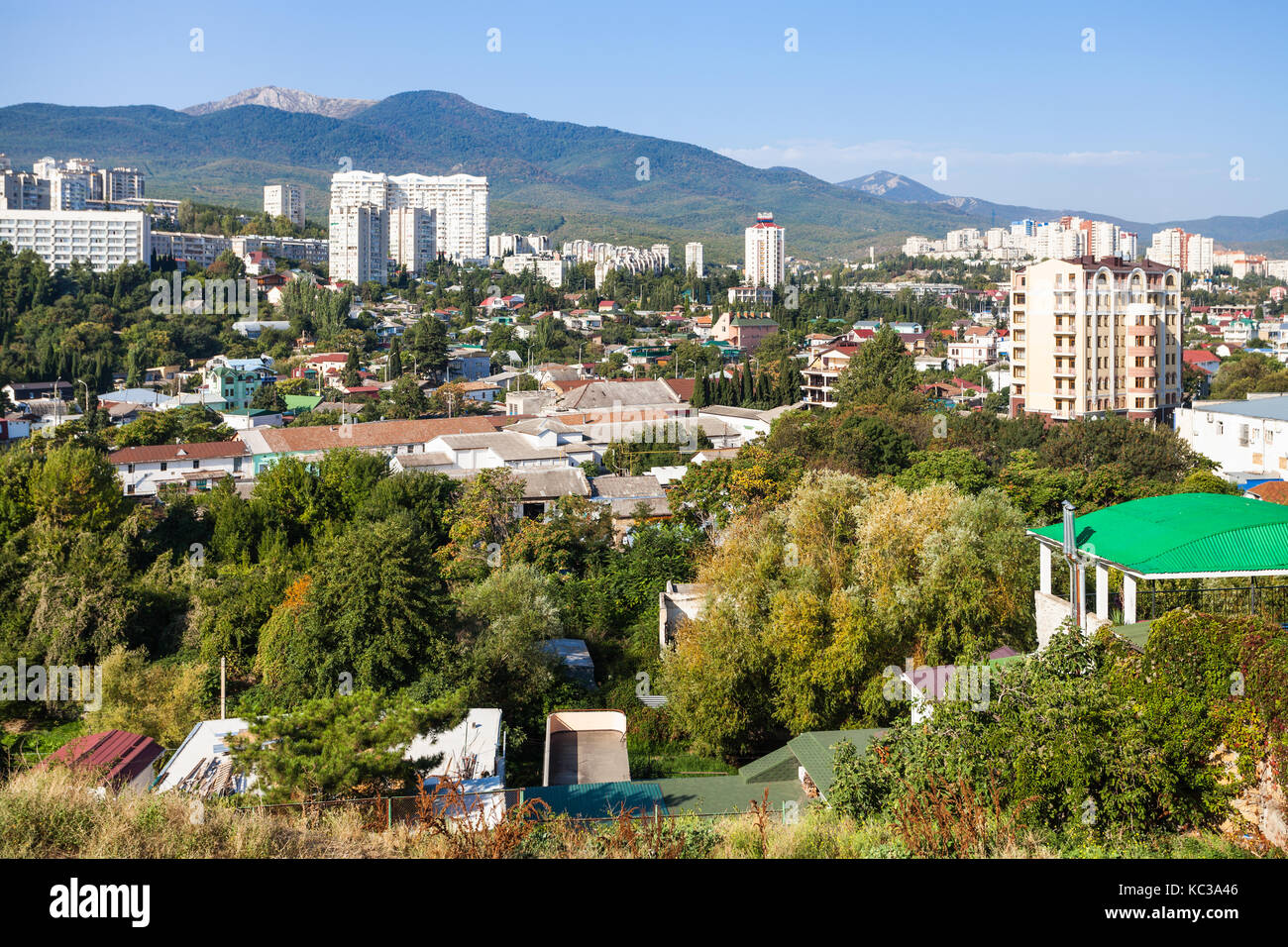 travel to Crimea - Alushta city skyline from Castle Hill in sunny morning Stock Photo
