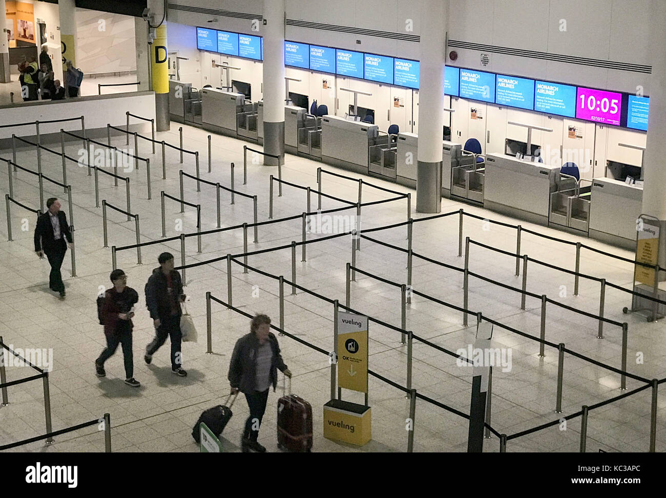Empty checkin desks at Gatwick Airport after Monarch Airlines