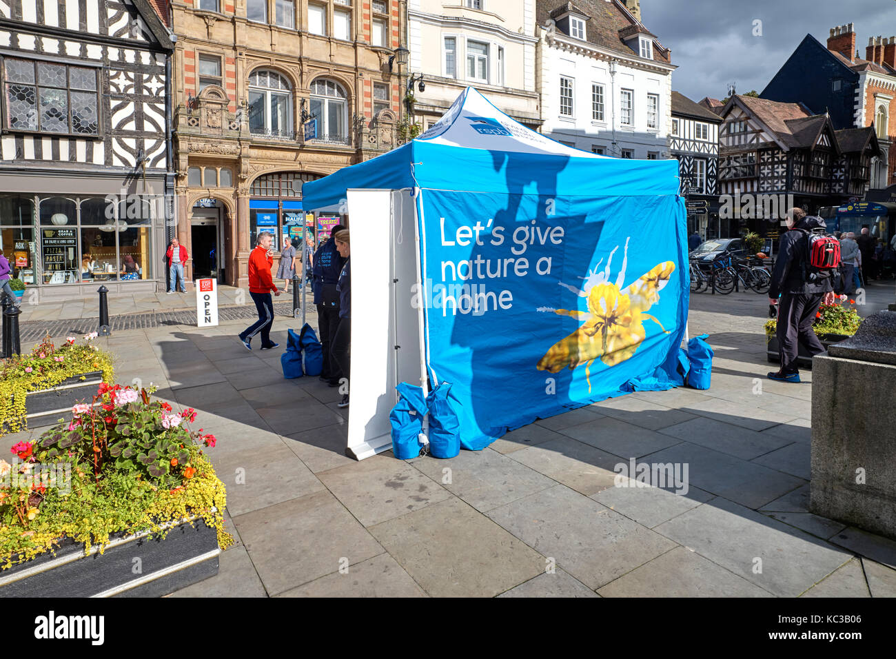 RSPB tent with ‘Let’s give nature a home’ in Shrewsbury Stock Photo