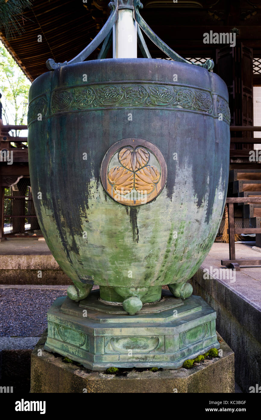 Kyoto, Japan - May 18, 2017: Ornament with lotus flowers on a water well in front of the Chion-In Temple Kyoto, Japan Stock Photo