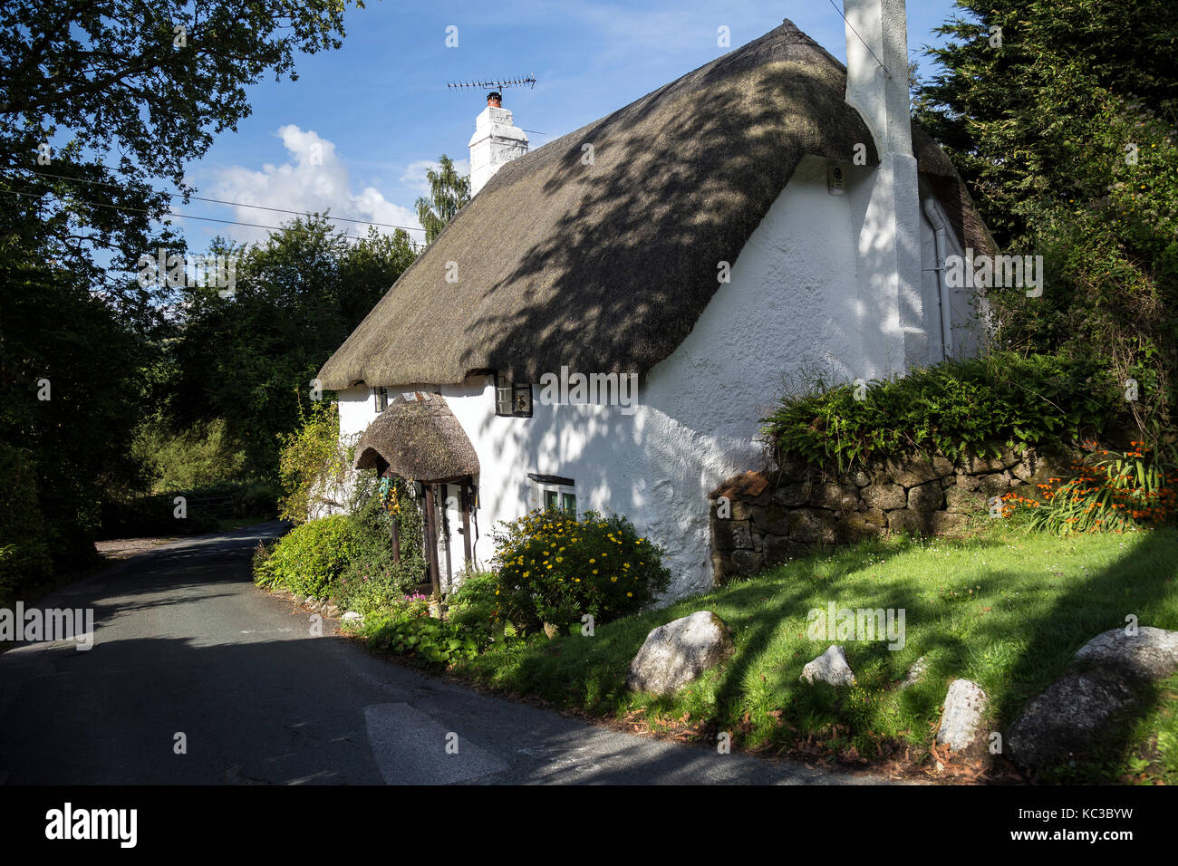 cob and thatch cottage in devon,england,Devon cottage,Dartmoor,Lustleigh Devon,Picture postcard village close by Lustleigh Cleave - a steep sided tree Stock Photo