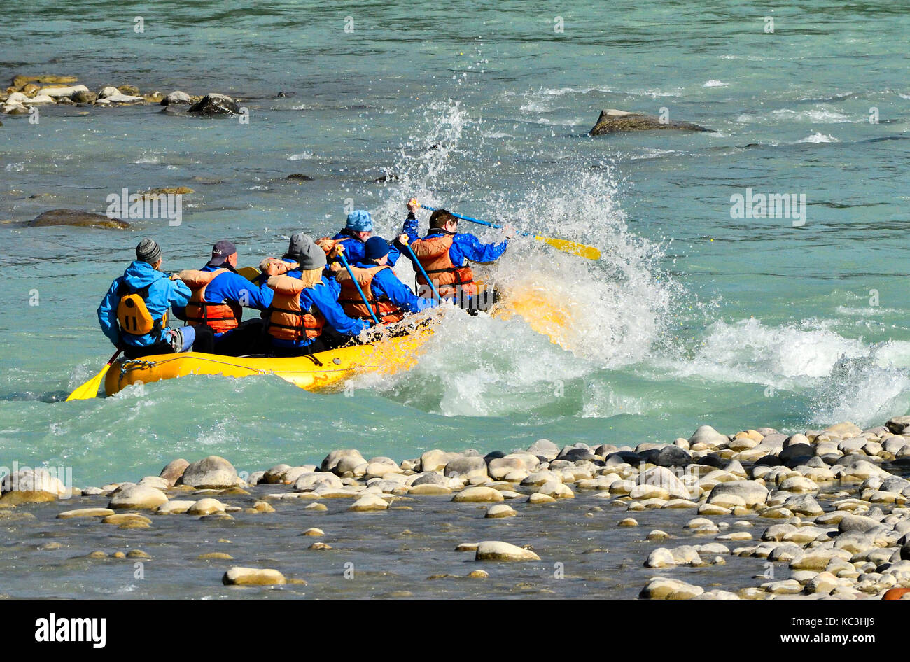 A group of tourists river rafting on the Athabasca River in Jasper National Park, Alberta Canada. Stock Photo