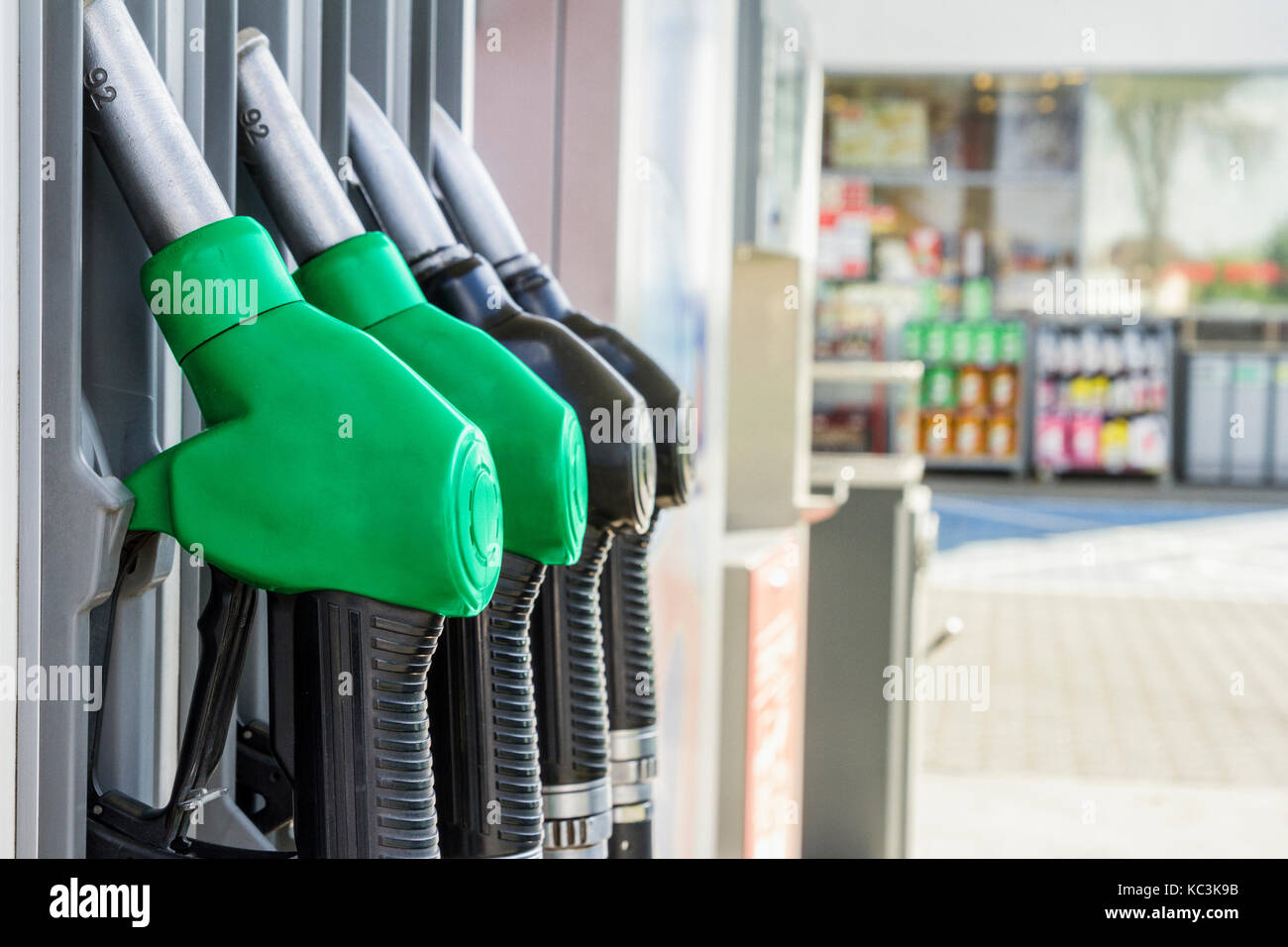 Gasoline and diesel distributor at the gas station. Gas pump nozzles