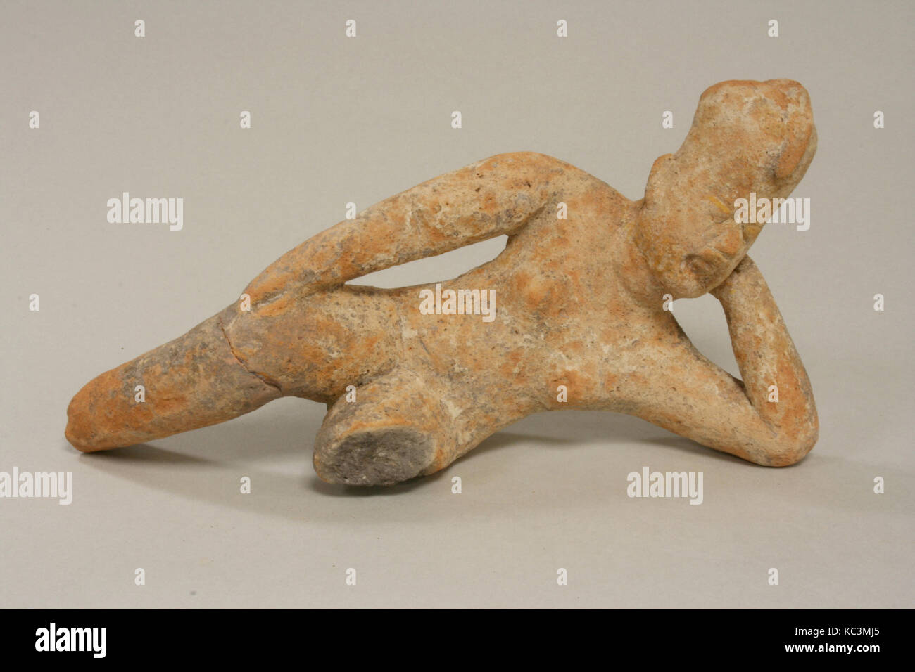 Reclining Ceramic Figure, 12th–9th century B.C., Mexico, Mesoamerica, Olmec, Ceramic, Length 9-1/8 in., Ceramics-Sculpture Stock Photo