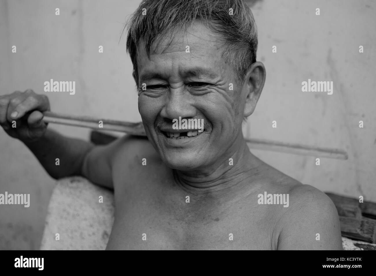 Old man sitting chair Black and White Stock Photos & Images - Alamy