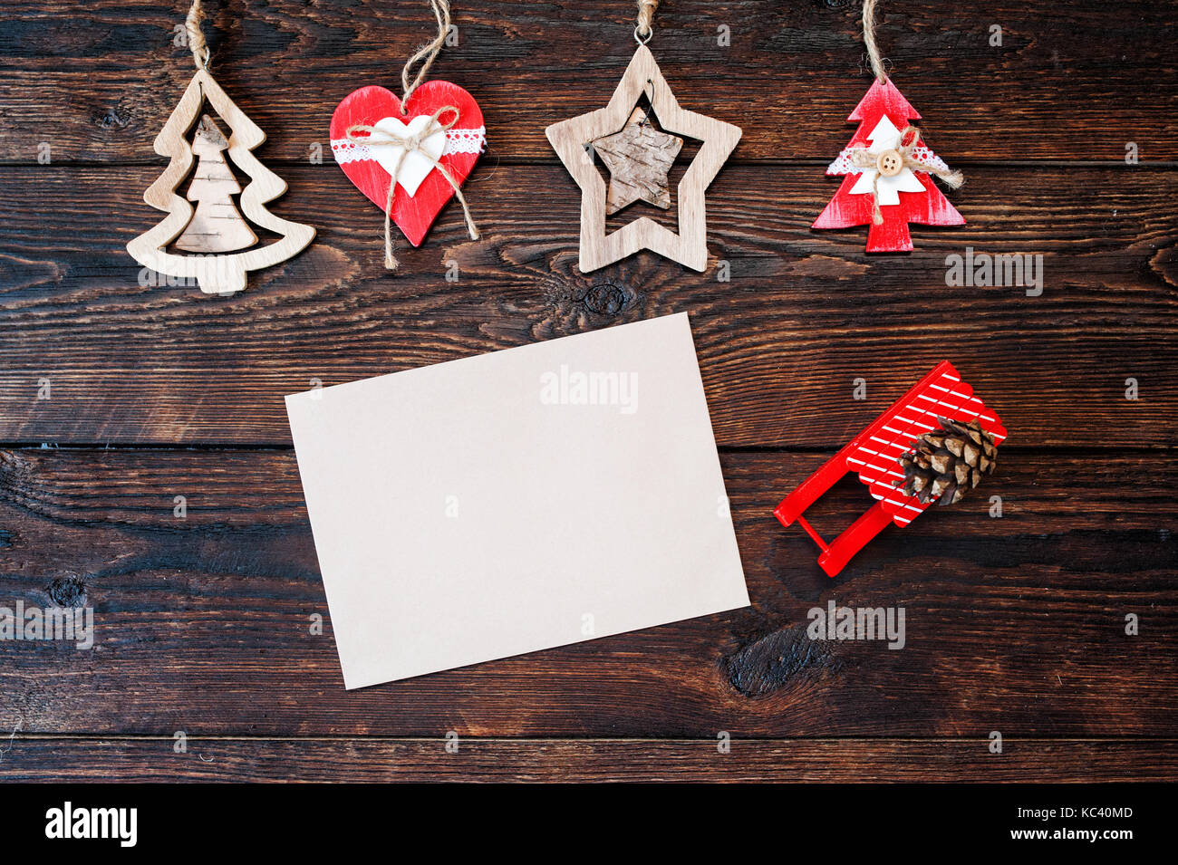 Mokcup Christmas composition of gift boxes and wooden toys on a background and place for text Stock Photo