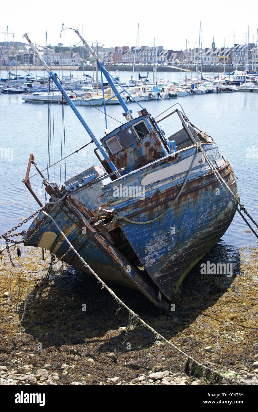 Wreck of old fishing boat stranded on the beach in Brittany Stock Photo ...