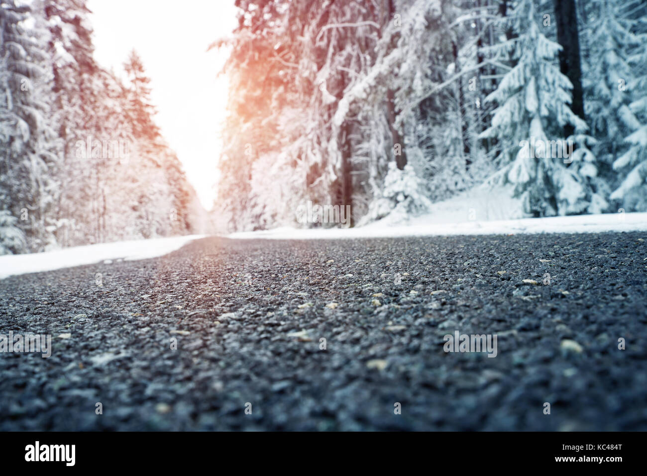 Asphalt road in snowy winter on beautiful day Stock Photo - Alamy