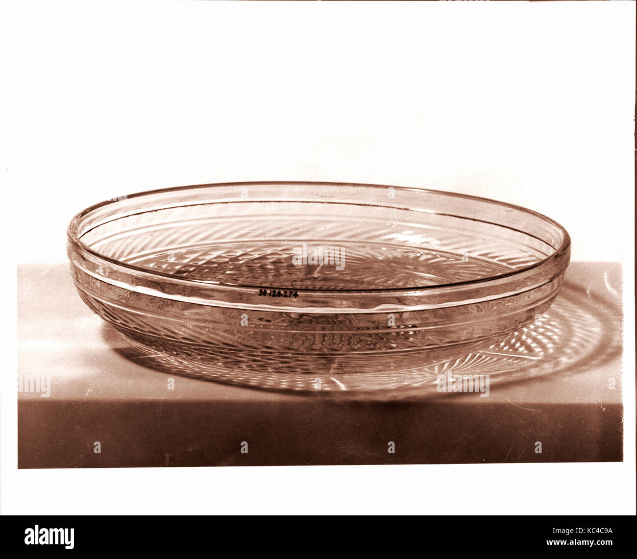 Rayed Dish, 1820–40, Blown molded lead glass, H. 2 in. (5.1 cm); Diam. 10 in. (25.4 cm), Glass Stock Photo