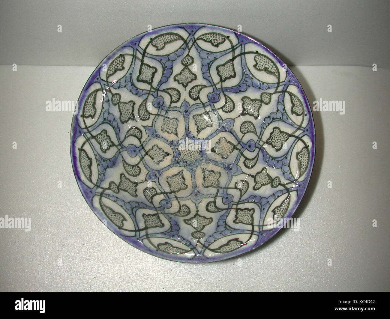 Black and Blue Painted Bowl, early 13th century, Made in Iran, probably Kashan, Stonepaste; polychrome painted under transparent Stock Photo