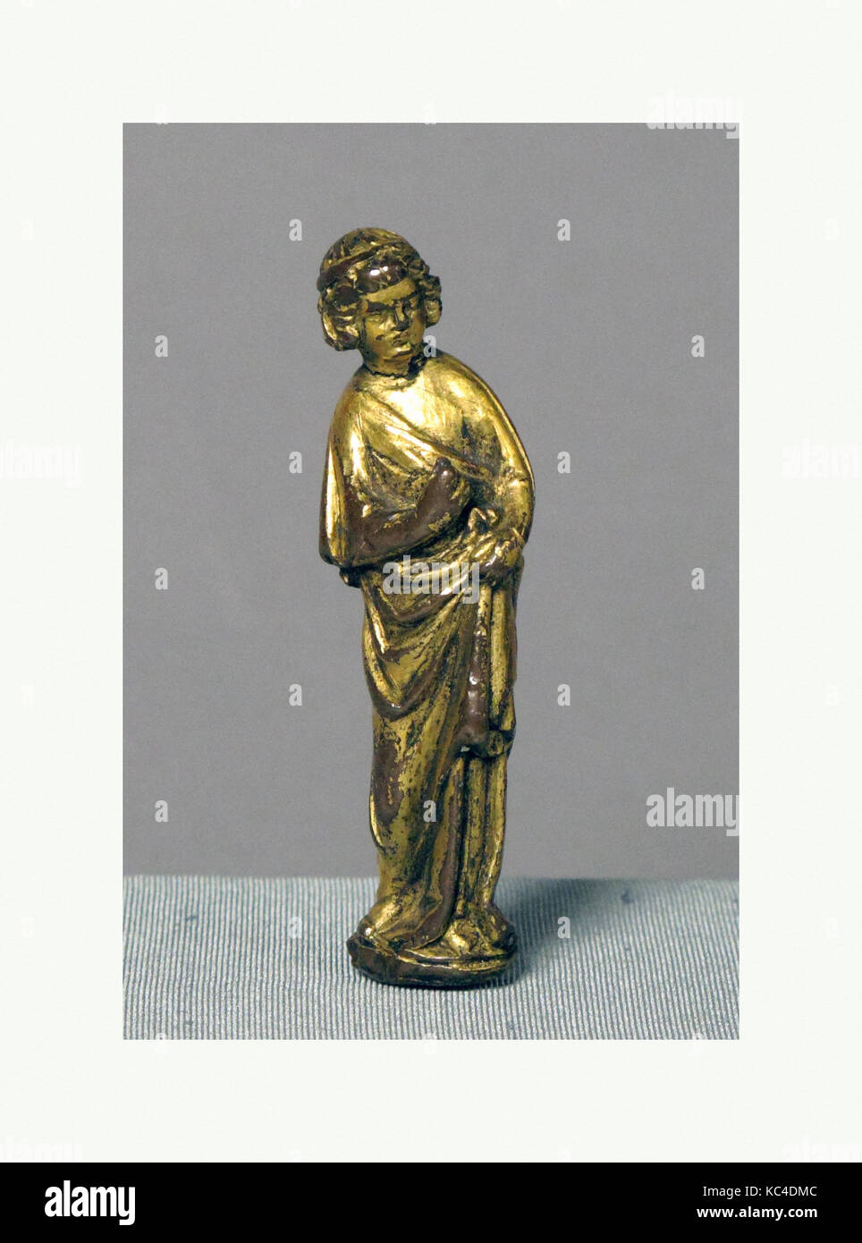 Angel, ca5, Northeast French, Copper Alloy with mercury gilding, Overall: 2 3/8 x 11/16 x 1/2 in. (6 x 1.7 x 1.2 cm), Metalwork Stock Photo