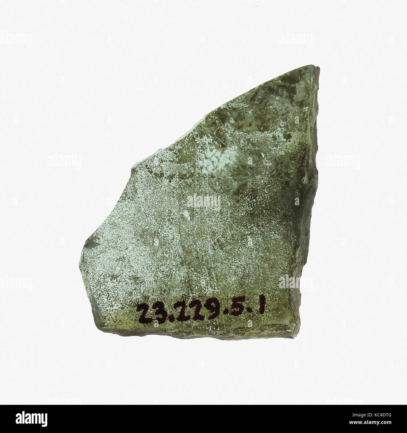 Glass Fragment, 11th century, French, Colorless glass, Overall: 1 3/16 x 1 in. (3 x 2.5 cm), Glass-Stained Stock Photo