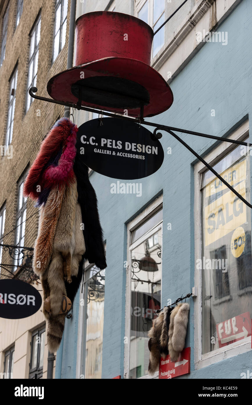 A shop with a top hat specialising in real fur clothes in Copenhagen, Denmark Stock Photo