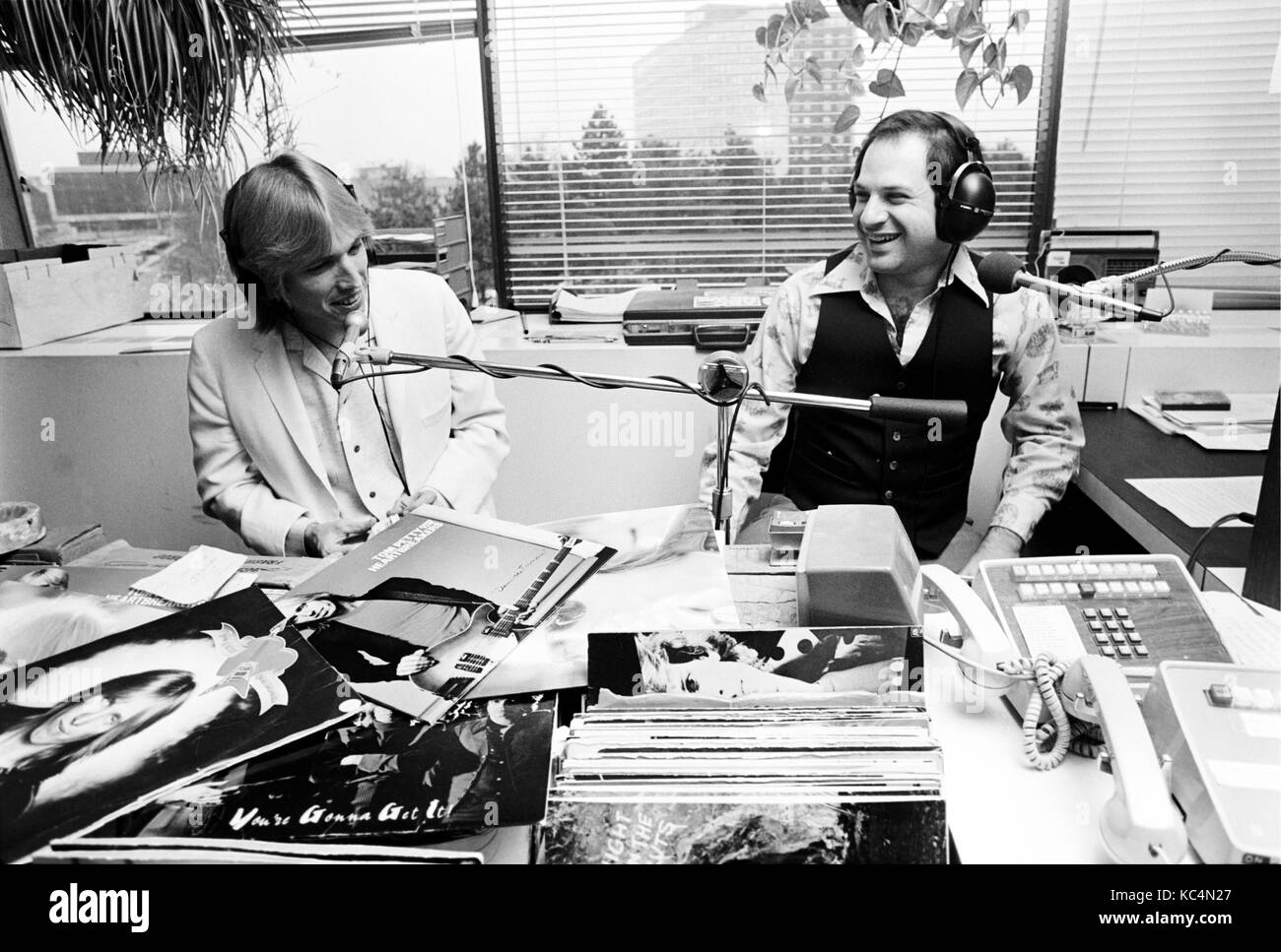 Tom Petty in the WYSP studios in Philadelphia, PA doing a radio interview to promote the record Damn the Torpedoes. November, 1979. © Scott Weiner/MediaPunch Stock Photo