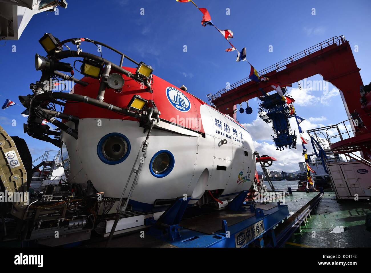 Sanya. 3rd Oct, 2017. Photo taken on Oct. 3, 2017 shows the manned submersible named Shenhai Yongshi, or deepsea warrior, in Sanya, south China's Hainan Province. China's new manned submersible, on board the ship Tansuo-1, returned to port in Sanya on Tuesday, after completing deep sea testing in the South China Sea. The manned submersible named Shenhai Yongshi reached a depth of 4,500 meters to test its functions and performance during an over 50-day expedition. Credit: Guo Cheng/Xinhua/Alamy Live News Stock Photo