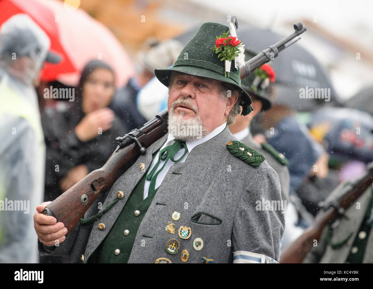 Munich, Germany. 03rd Oct, 2017. Gun shooters arrive at the Bavaria at the Oktoberfest fun fair on the Theresienwiese meadow in Munich, Germany, 03 October 2017. After 18 days, the 184th Oktoberfest ends on 03 October 2017. Credit: Matthias Balk/dpa/Alamy Live News Stock Photo