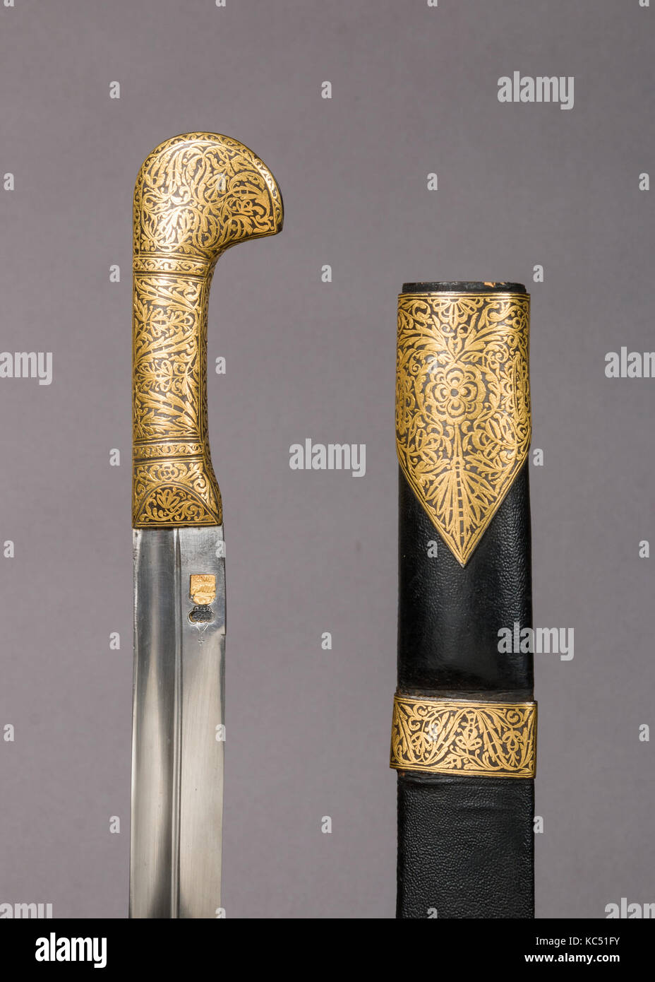 Sword with Sheath, 19th century, Caucasian, Steel, leather, gold, H. with scabbard 39 7/8 in. (101.3 cm); H. without scabbard 37 Stock Photo