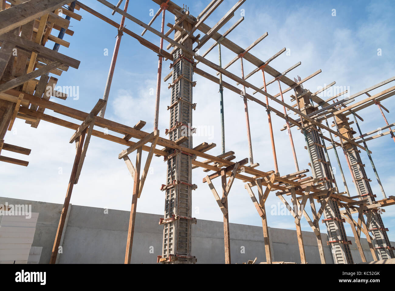 Wooden frame supporting the beam structure under construction Stock