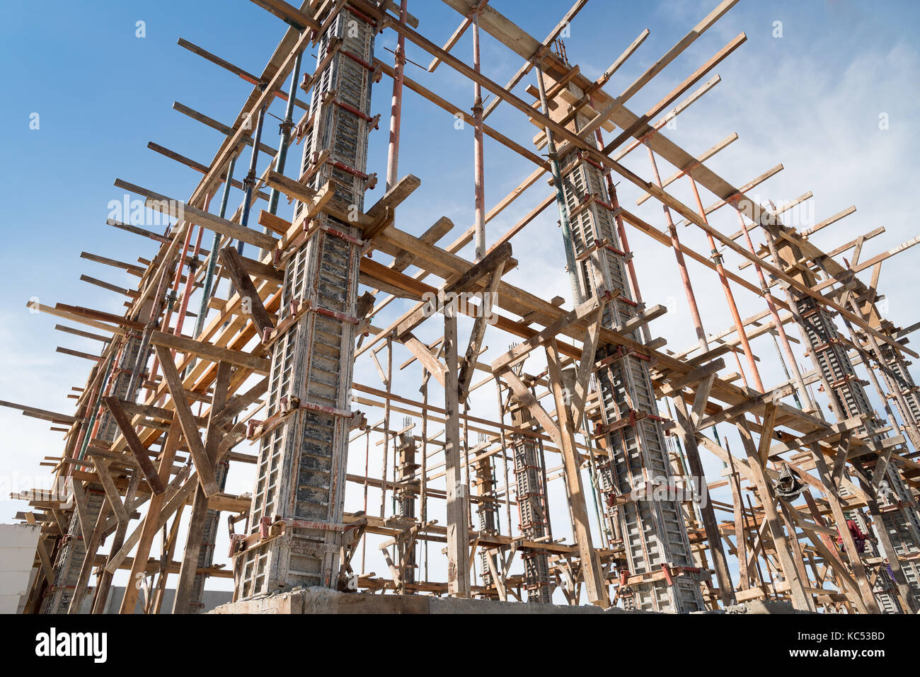 Wooden frame supporting the beam structure under construction Stock
