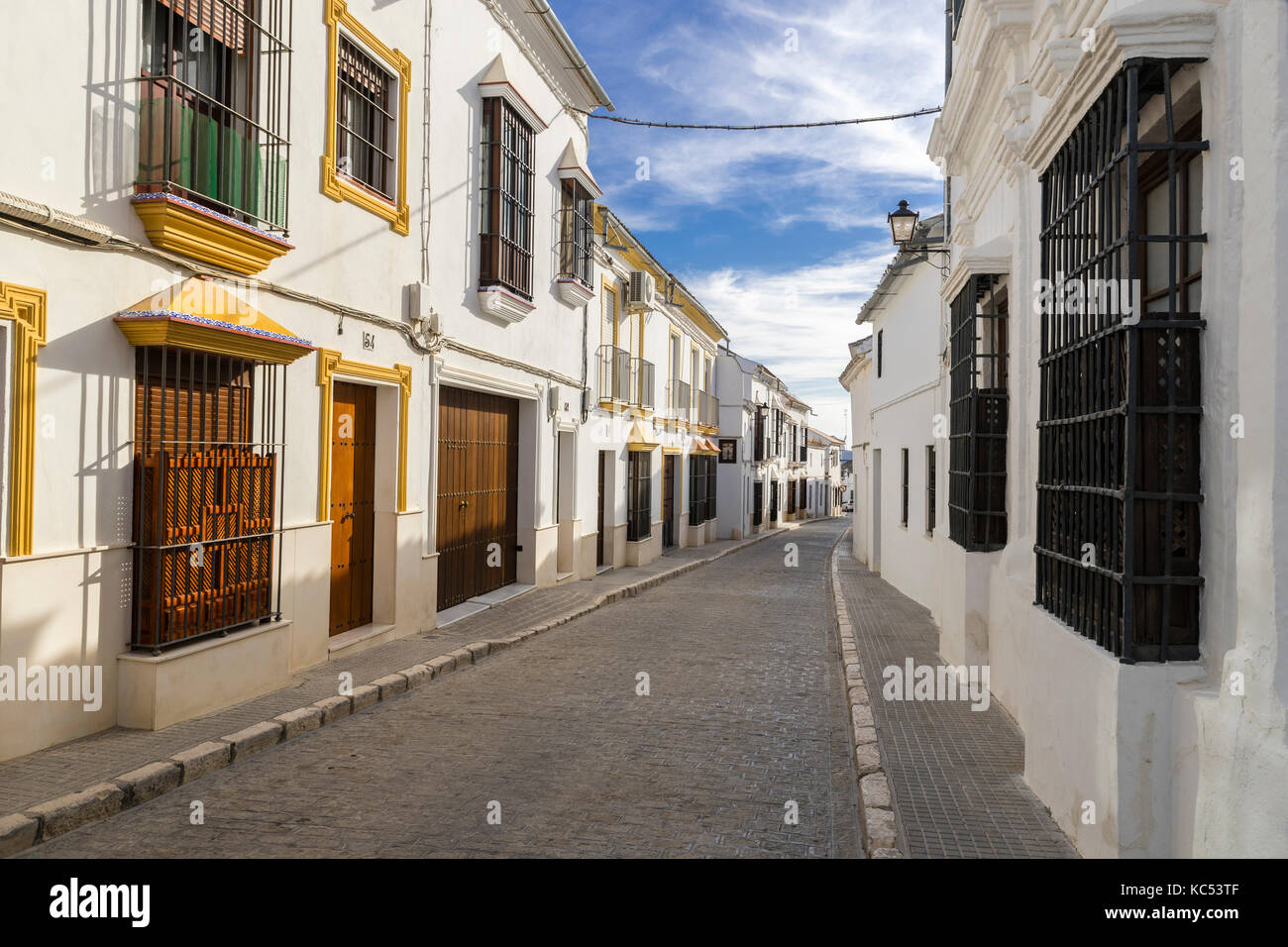 Lane, typical window grilles, Osuna, province of Seville, Andalusia, Spain Stock Photo