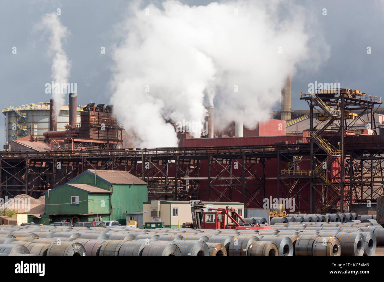 Sault Ste. Marie, Ontario Canada - Steel rolls at the Algoma steel mill on the shore of the St. Mary's River. Stock Photo