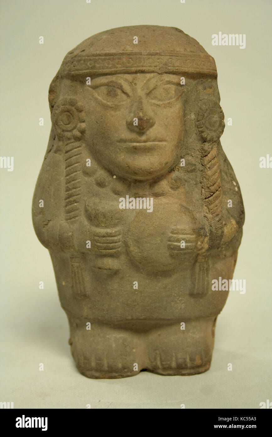 Standing Ceramic Figure Holding Disk, 4th–5th century Stock Photo