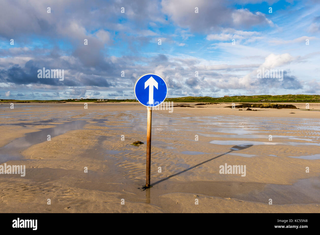 Route marking to the tidal island of Omey Island, only navigable at low tide, Omey Island, County Galway, Ireland Stock Photo
