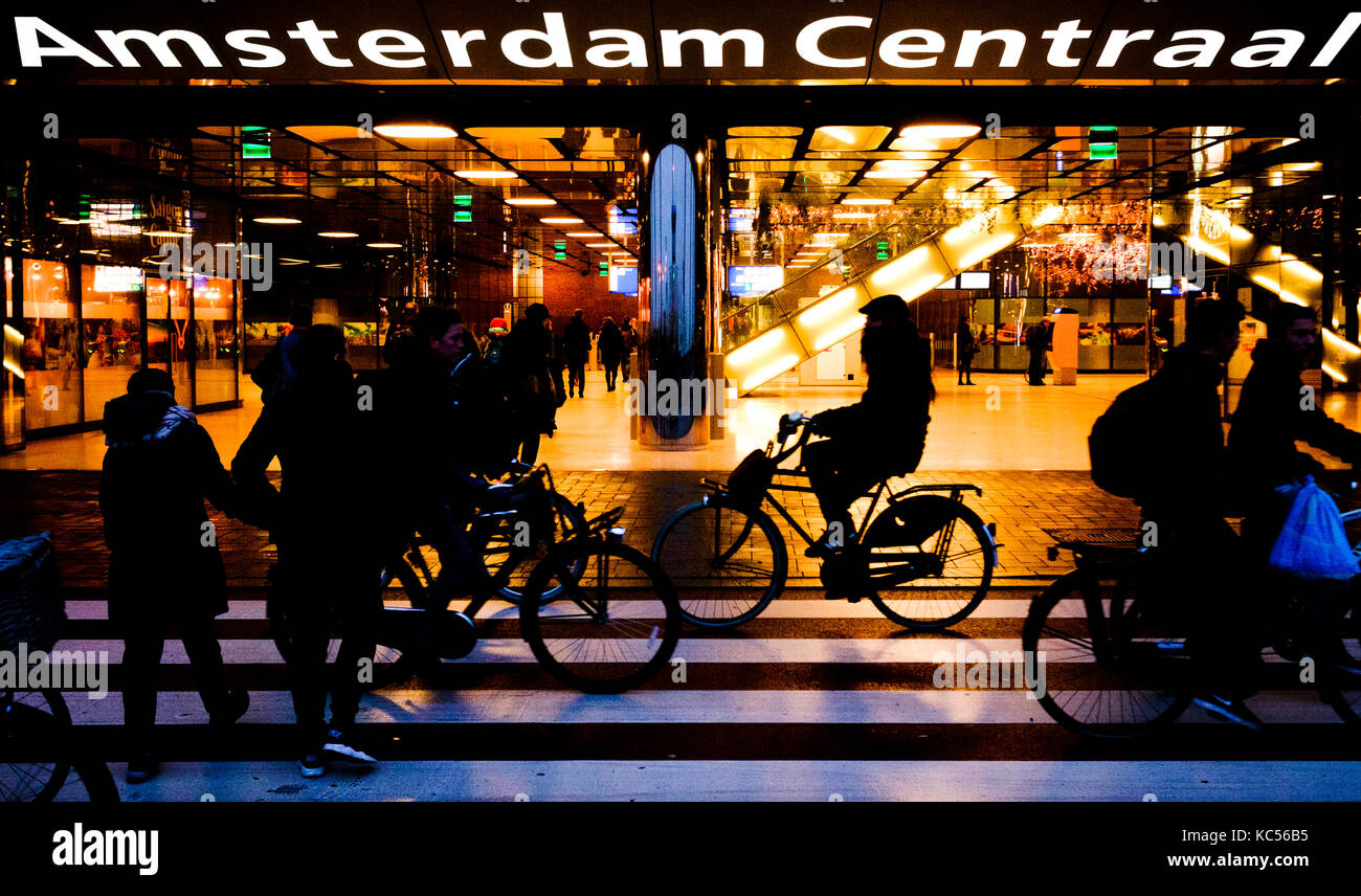 Pedestrian crossing with cyclists in front of the entrance, Amsterdam Central Station, Amsterdam Centraal, Amsterdam Stock Photo