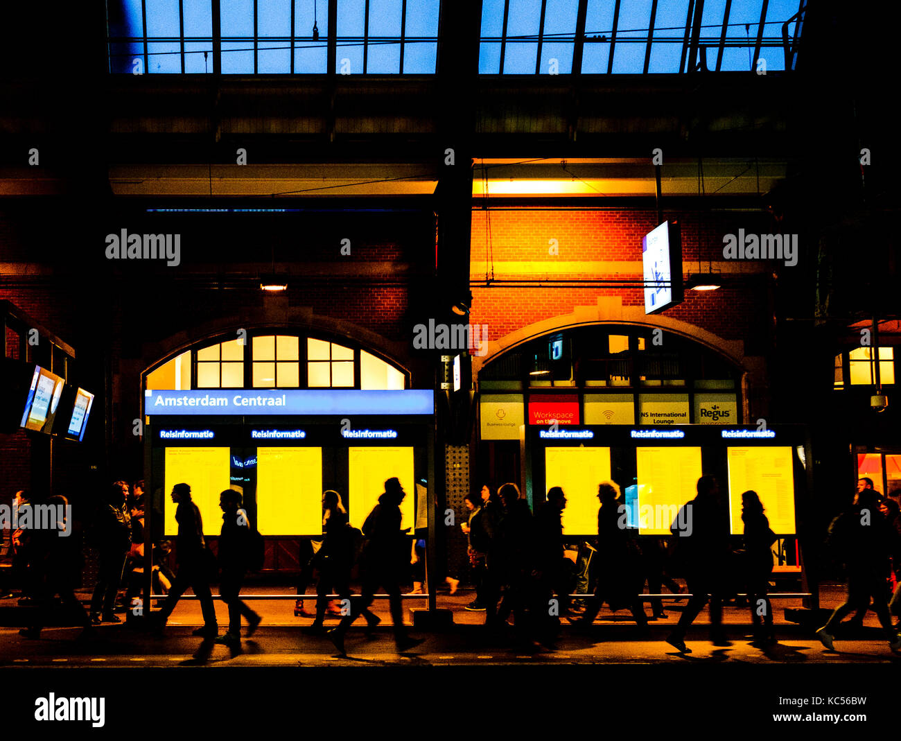 Passenger silhouettes, rush hour at the main station, Amsterdam, Netherlands Stock Photo