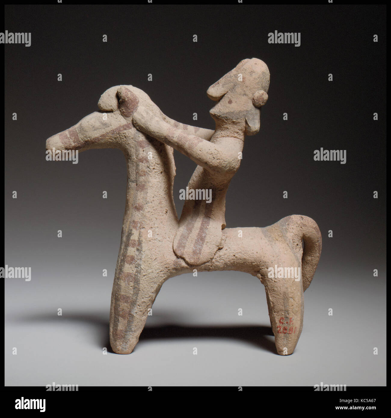Horse and rider, Cypro-Archaic II, ca. 600–480 B.C., Cypriot, Terracotta; hand-made, H. 5 1/16 in. (12.9 cm), Terracottas Stock Photo
