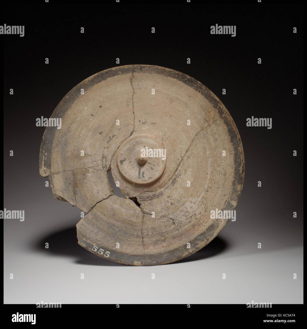 Votive shield, Cypro-Archaic II, ca. 600–480 B.C., Cypriot, Terracotta; wheel-made, diameter 7 3/16 in. (18.3 cm), Vases Stock Photo