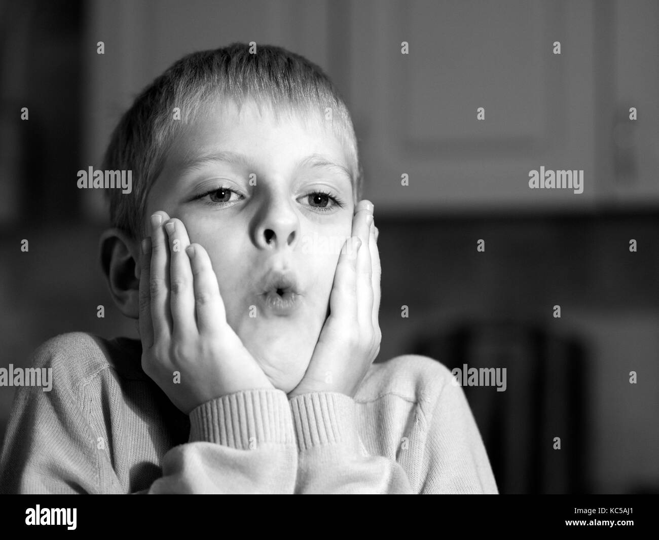 Surprised caucasian boy. Black and white Stock Photo