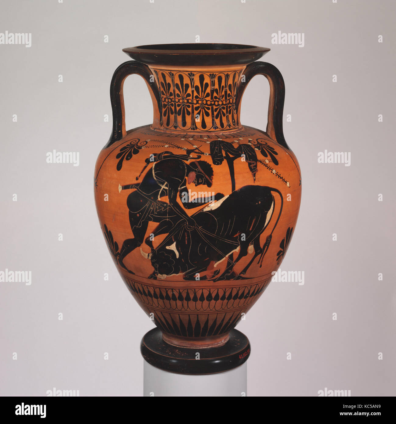 Terracotta neck-amphora (jar) with Herakles and a bull, ca. 520–510 B.C Stock Photo