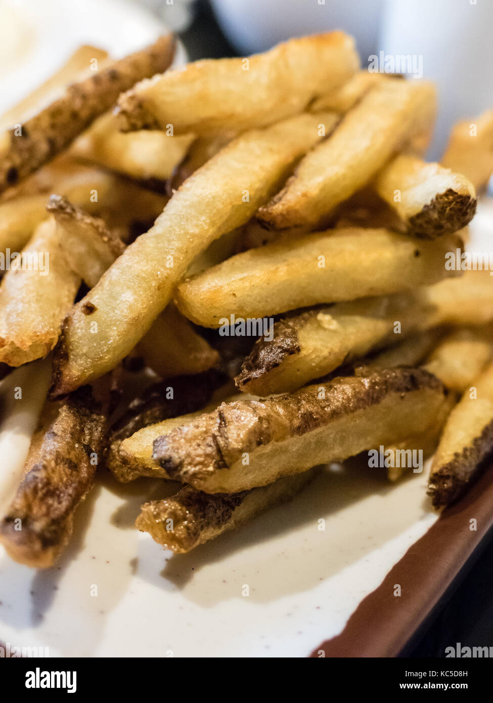 French fries with skin served in plate, fast food Stock Photo Alamy