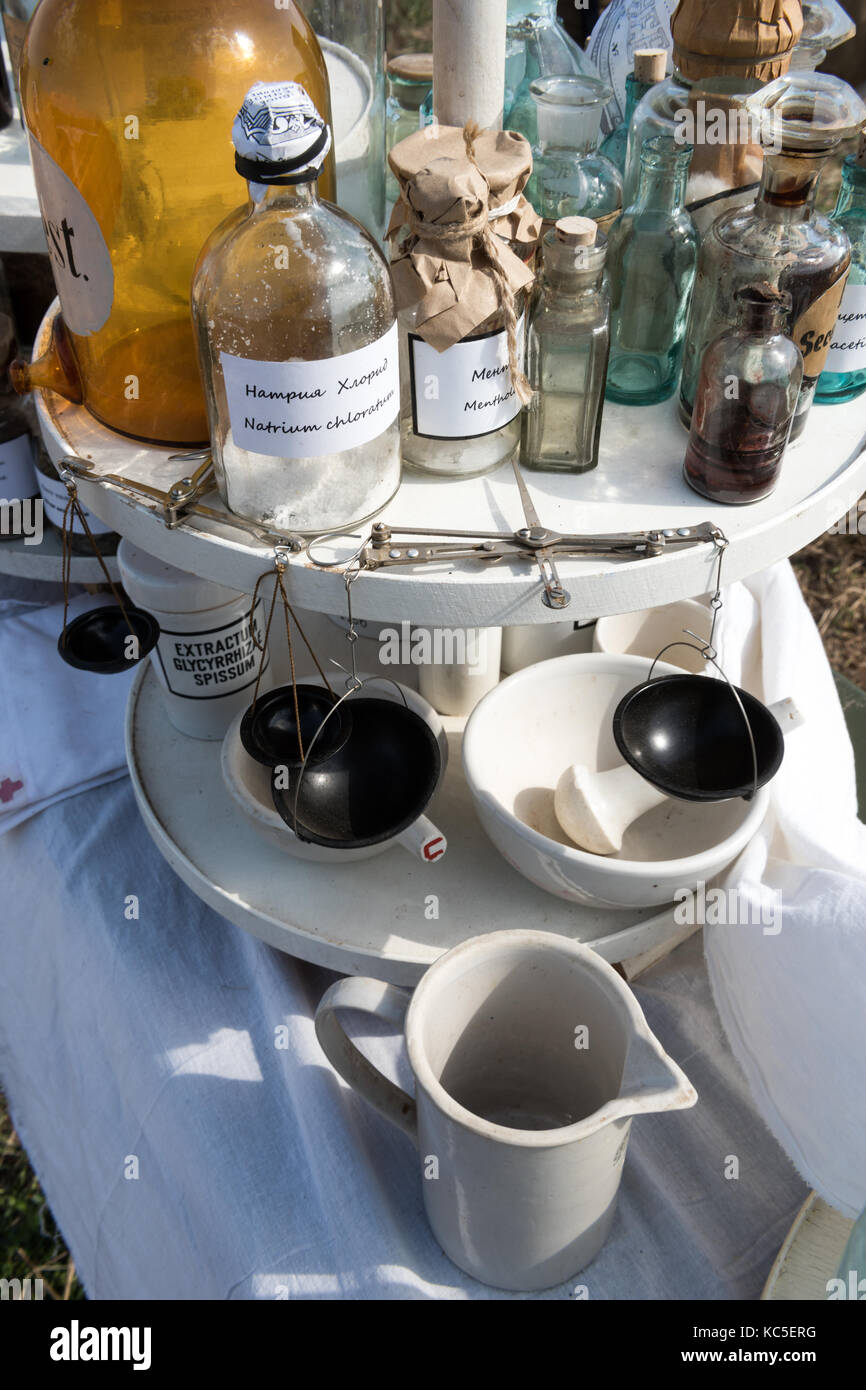 The medicine and equipment of the old pharmacy in the field hospital of the Second World War. Historical reconstruction. Stock Photo