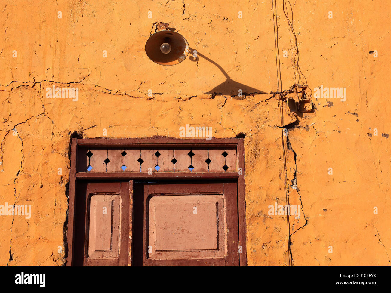 Elephantine Island, House facade with lamp over the door in a Nubian village, Upper Egypt Stock Photo