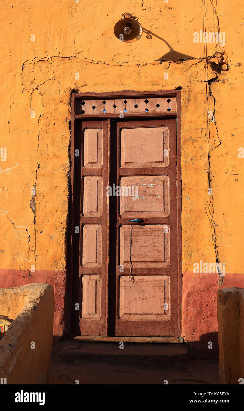 Elephantine Island, House facade with lamp over the door in a Nubian village, Upper Egypt Stock Photo