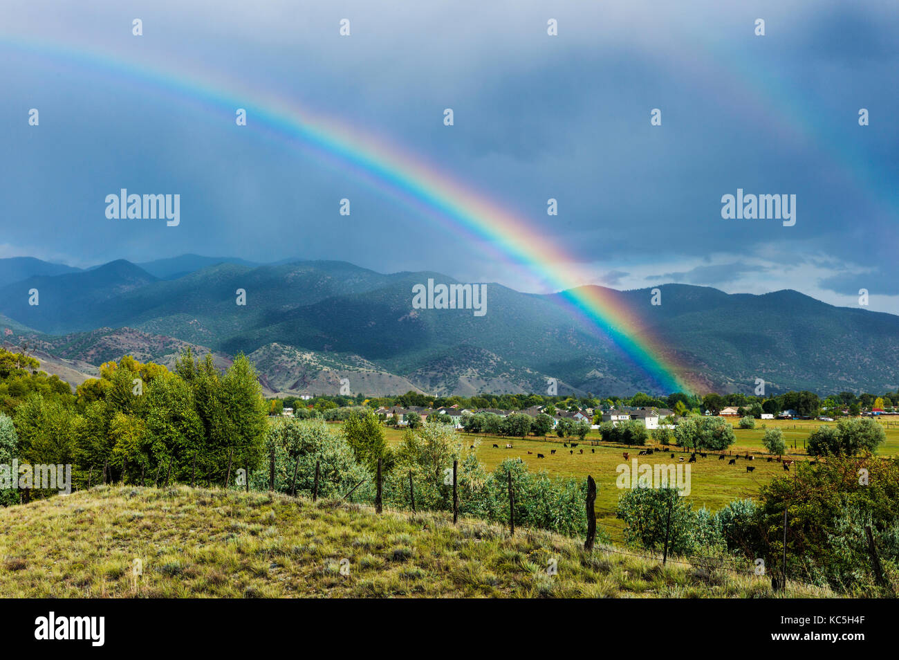 Rainbow over the small mountain town of Salida, Colorado, USA Stock Photo