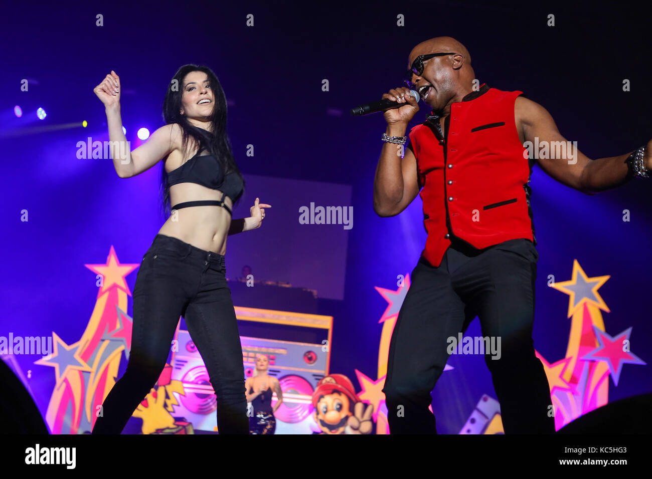 Haddaway (civil name Alexander Nestor Haddaway), Trinidadian-German singer performs his 90s Eurodance hit 'What is love' (here with female dance) at 90er Party Arena Wetzlar (party with mainly Eurodance-stars from the 90s), Rittal-Arena, Wetzlar, Germany, 30th September, 2017. Credit: Christian Lademann Stock Photo