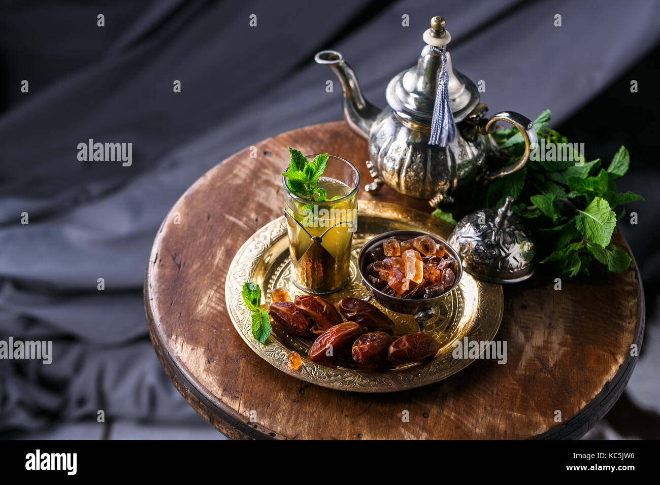 Traditional moroccan mint tea with copper teapot, dates and sugar Stock Photo Alamy
