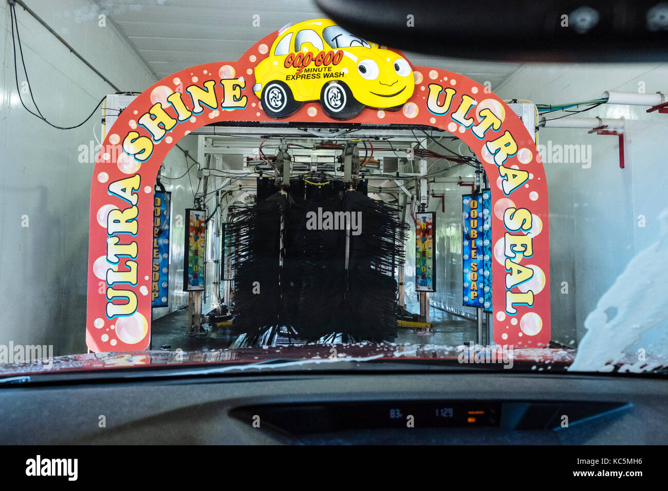 Driving through a Goo Goo automated car wash, Montgomery Alabama, USA. Stock Photo