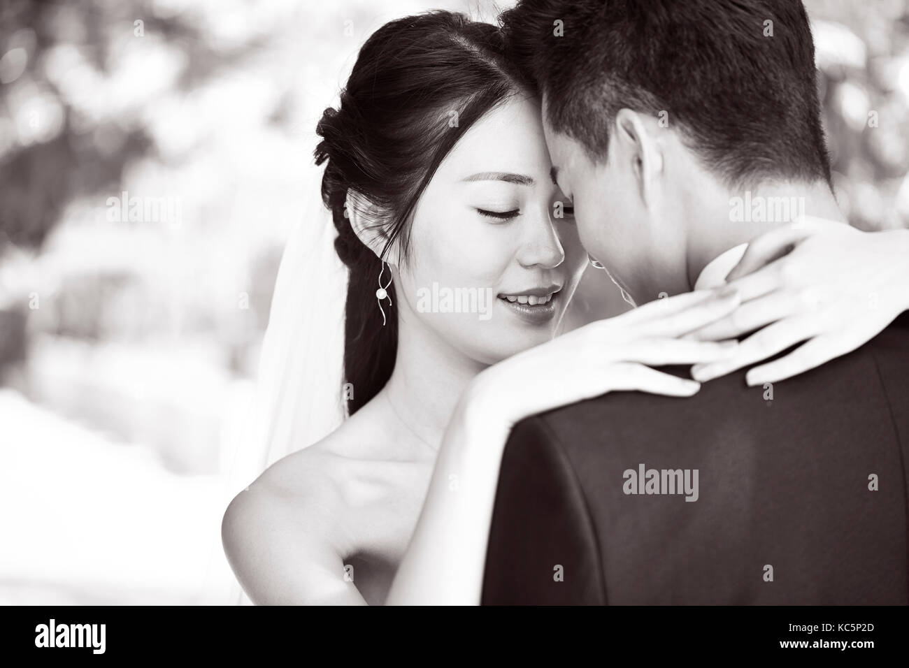 close-up portrait of intimate wedding couple, black and white Stock