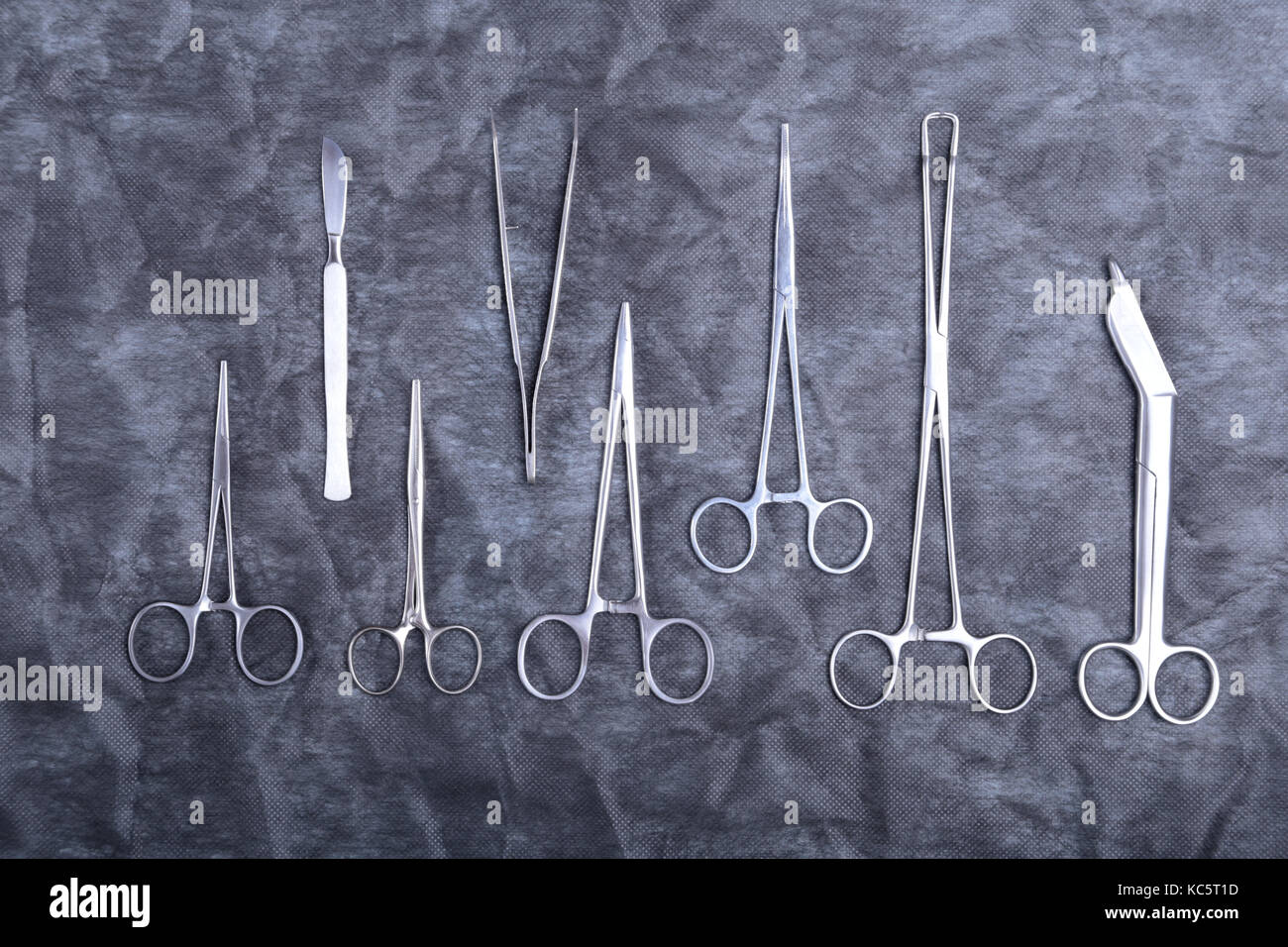 Medical instruments for dentists on blue table Stock Photo Alamy