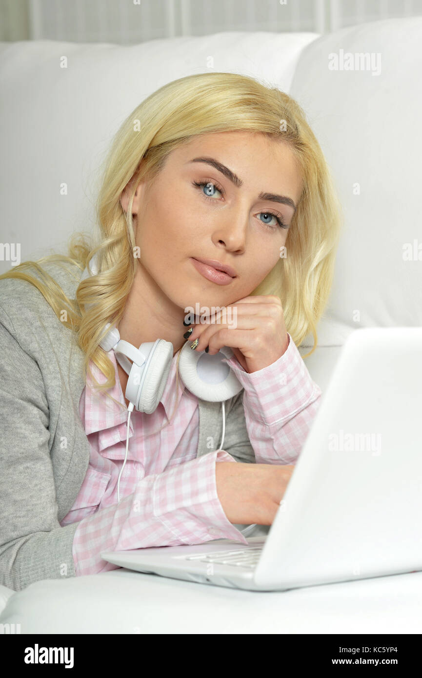 young woman using laptop Stock Photo - Alamy